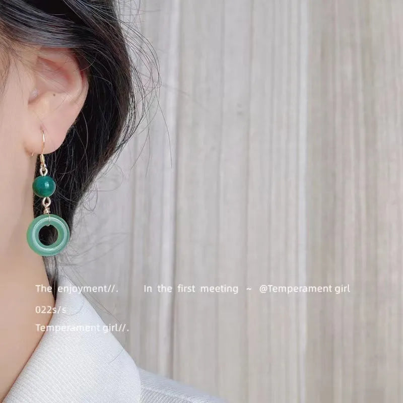 Green Chinese peace buckle earrings with geometric design and gold plating