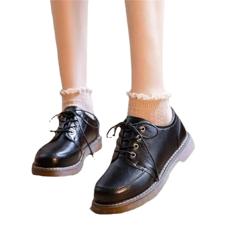 Preppy style retro Mary Jane women's shoes in black with round toe and front lace-up design