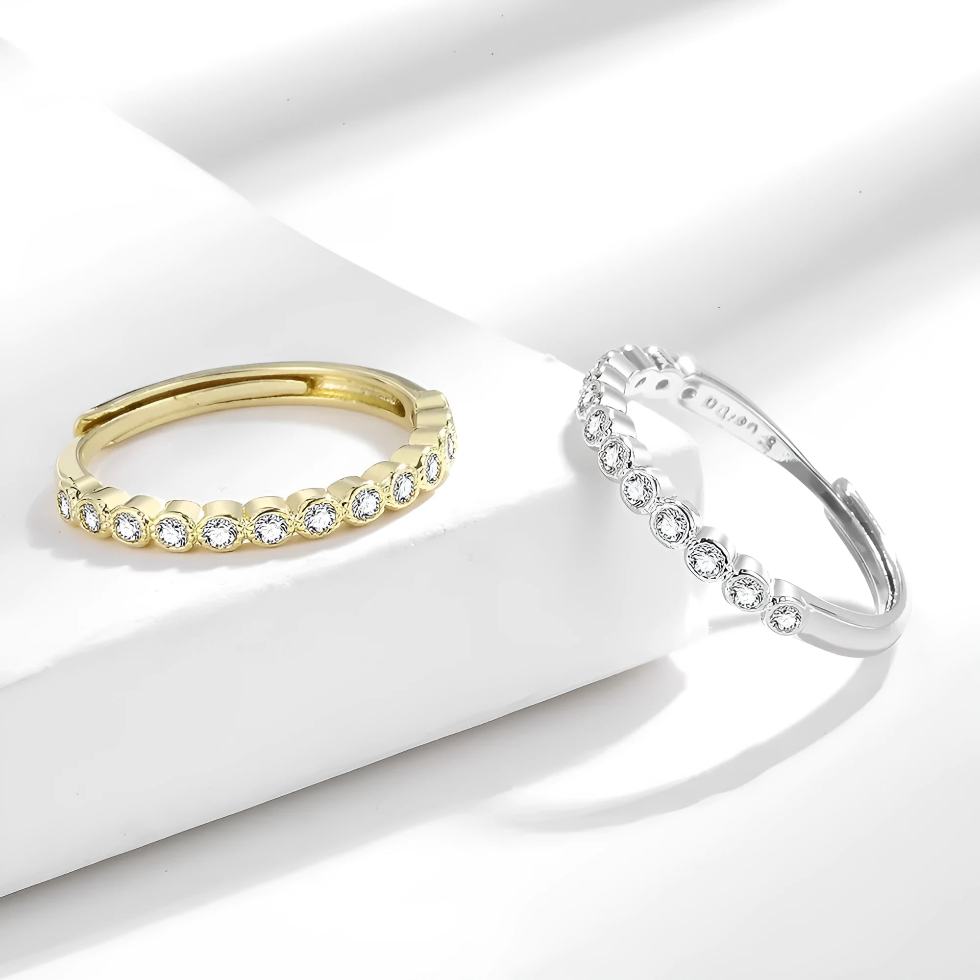 Geometric diamond tail ring with open mouth design in copper with electroplated finish
