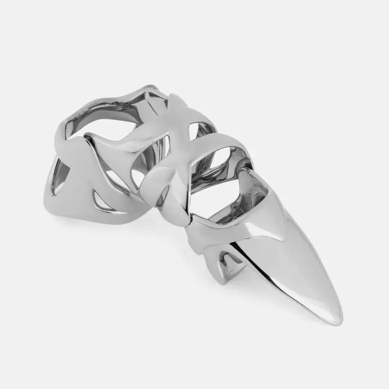 Silver punk armour finger stall ring on a finger, showing its one-piece, layered metal design.