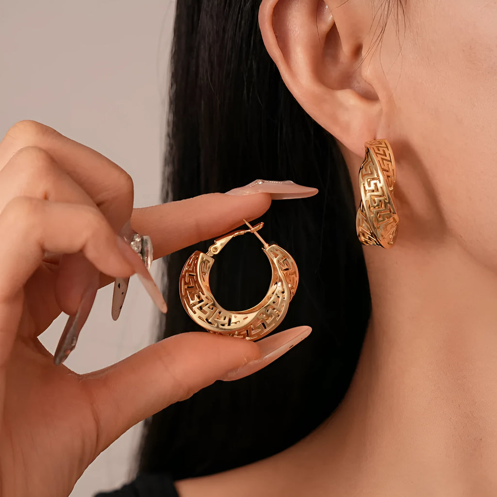 Gold and silver twisted round hollow geometric copper stud earrings for women