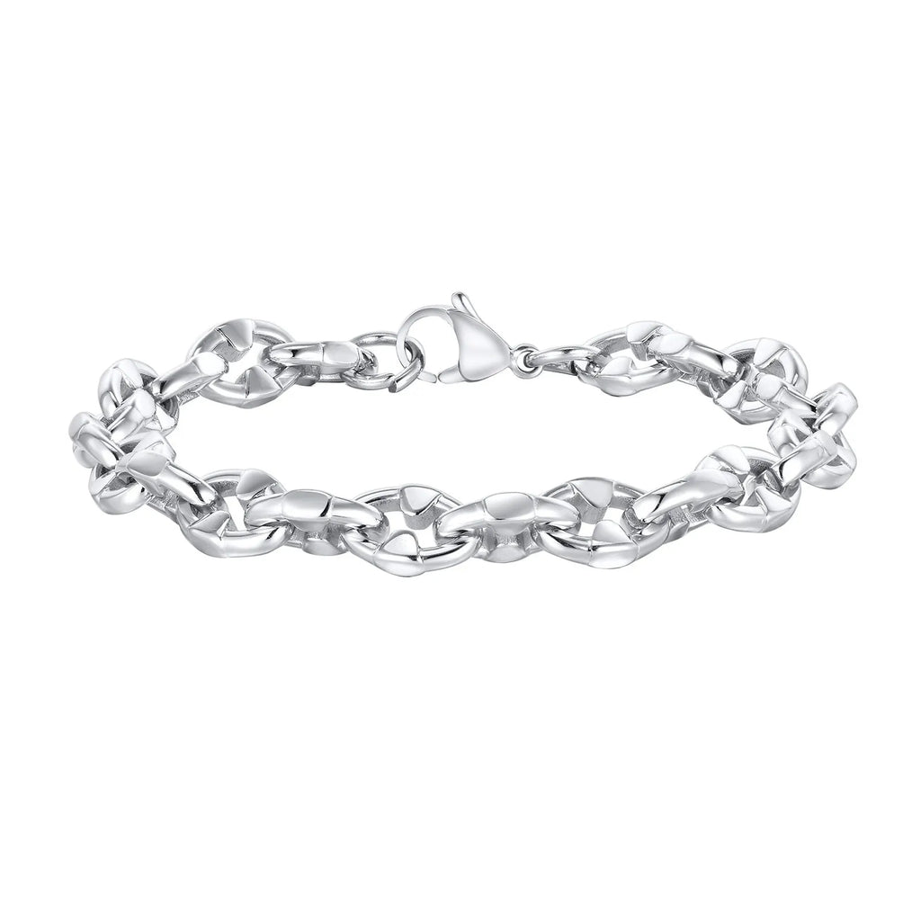 Close-up of a thick geometric chain bracelet made from polished stainless steel, on a wrist.