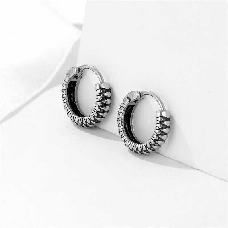 Geometric round titanium steel earrings with retro twist design and silver stripes