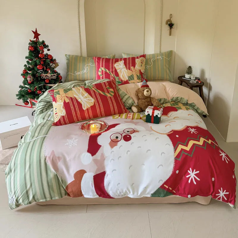 Christmas cartoon print bedding four-piece set on a bed, showing duvet cover and pillowcases in a festive pattern.