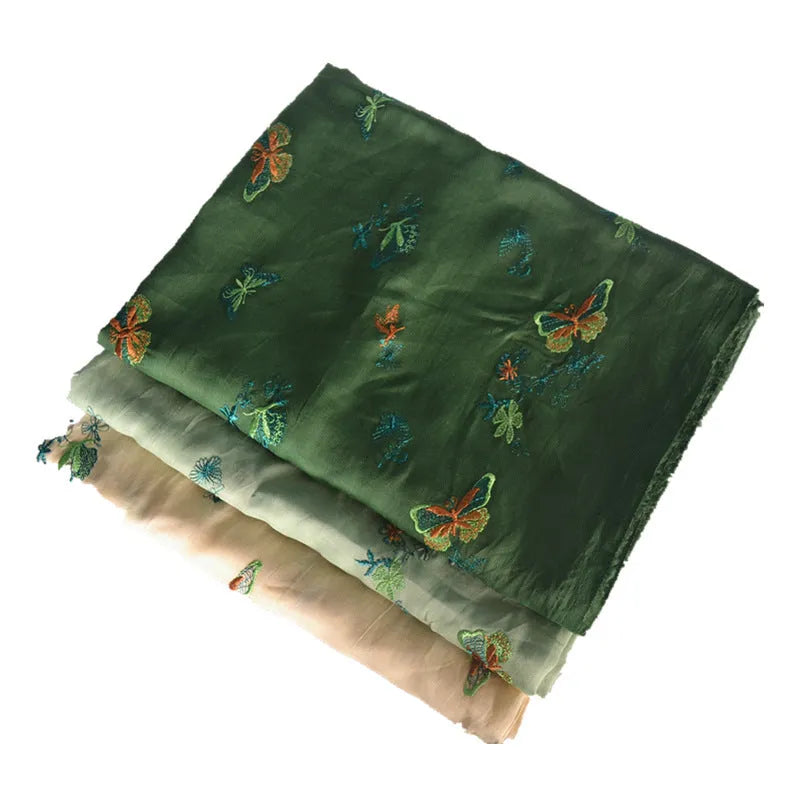A piece of pure ramie fabric in a choice of beige, grass green or dark green, shown with a width of 140cm.