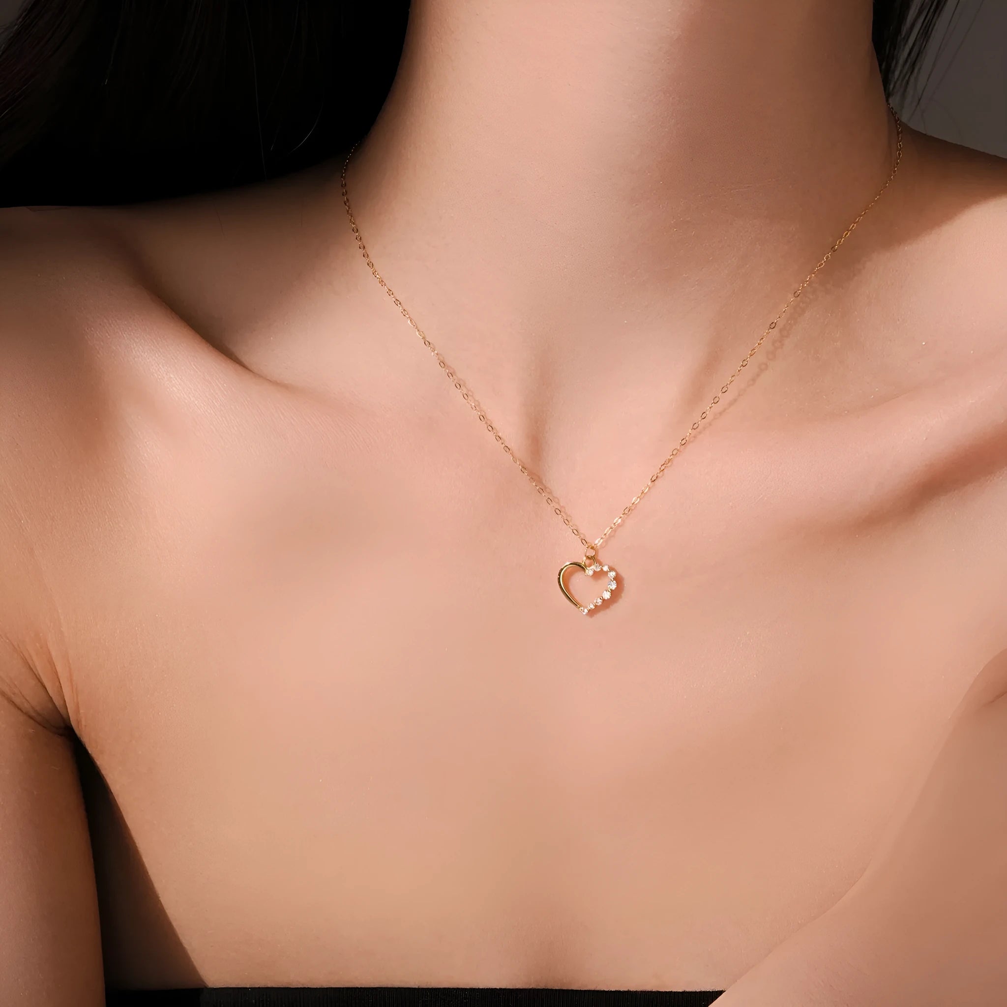 S925 sterling silver hollow heart pendant necklace with regular chain, available in white gold or 18K gold finish.