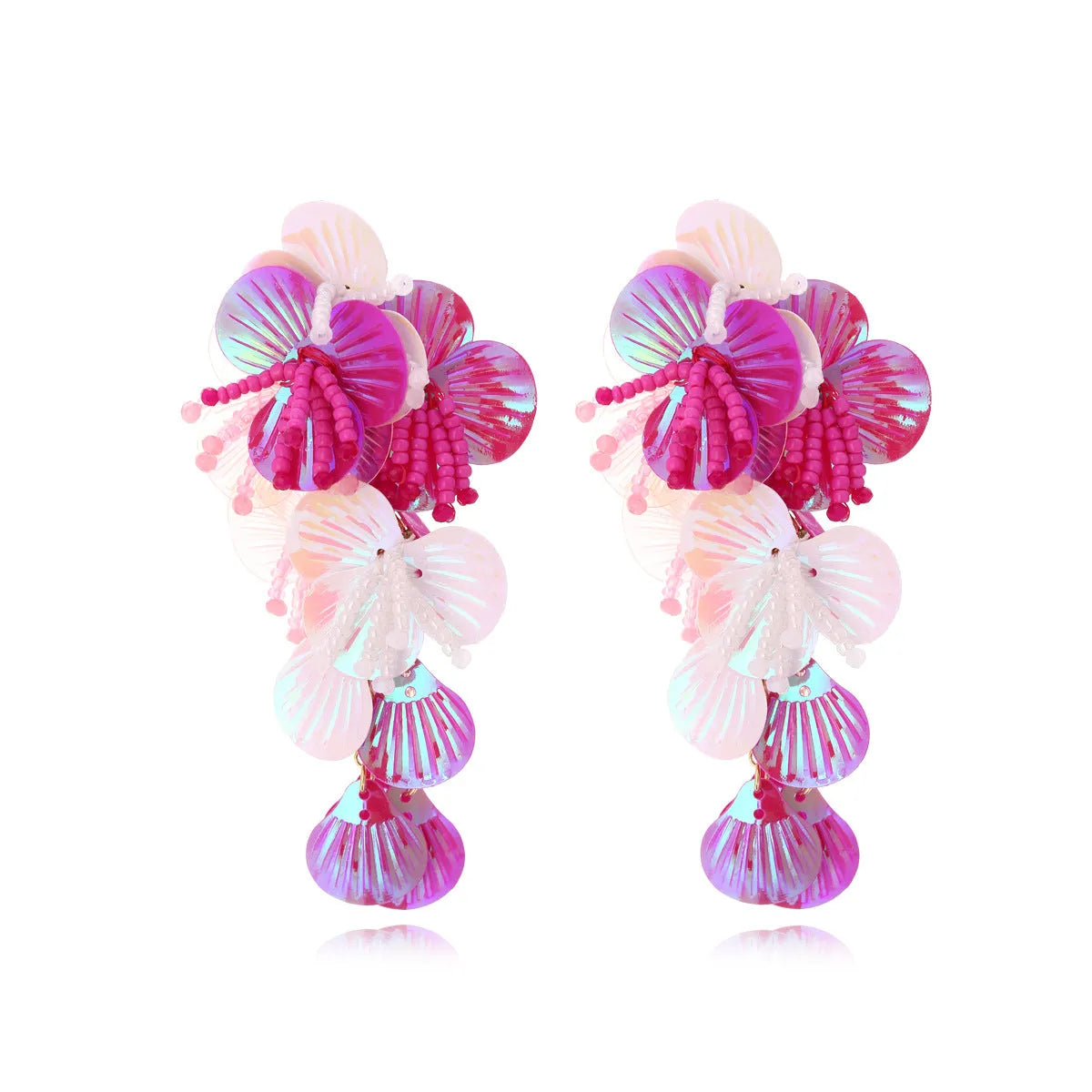 Close-up of handmade exaggerated flower and leaf bead earrings in a colourful colour option.