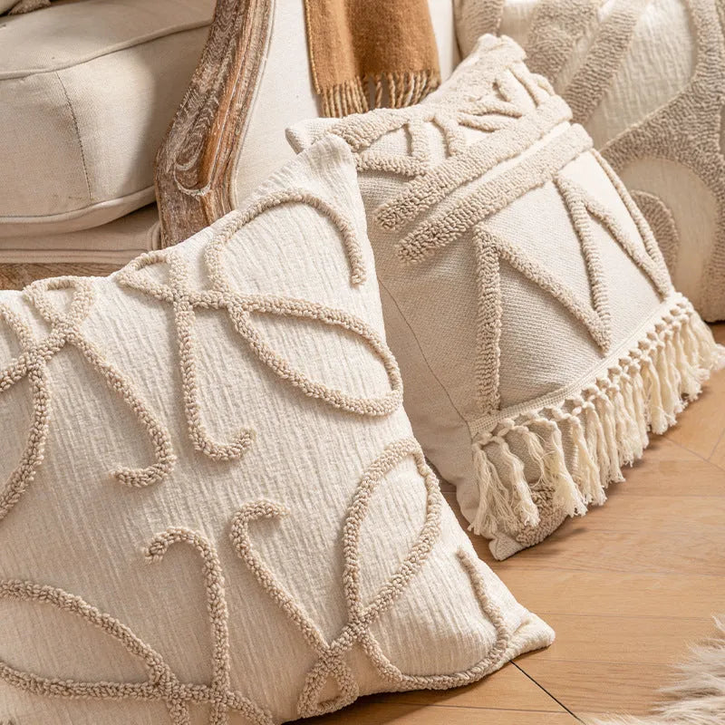 Knitted cushion cover with tassel edge detailing showing stripe pattern and pp cotton filler