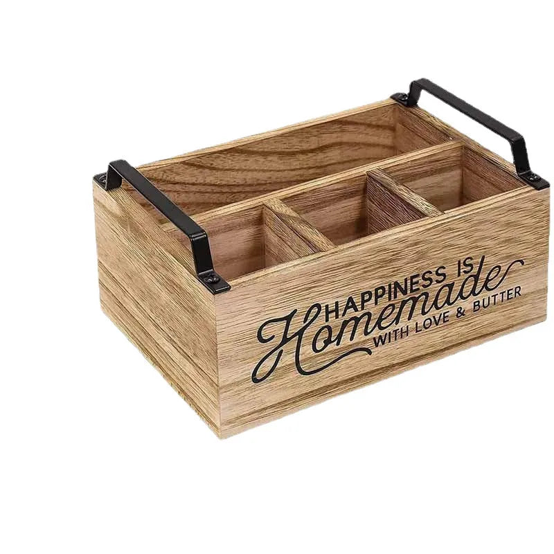 Large wooden kitchen storage box with internal grid divider for organising utensils.