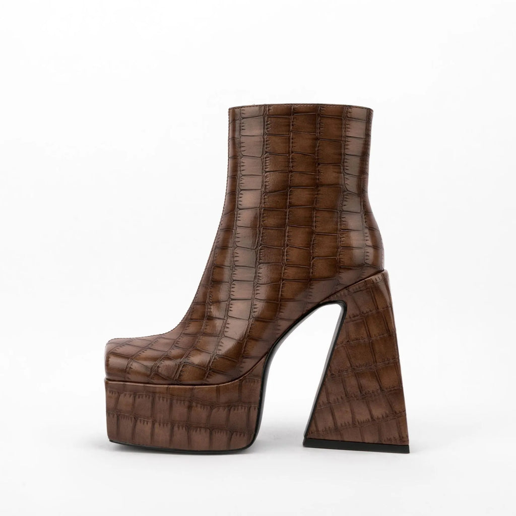 Women's super high heel ankle boots in red, green, black, beige, and brown colours with artificial PU upper.