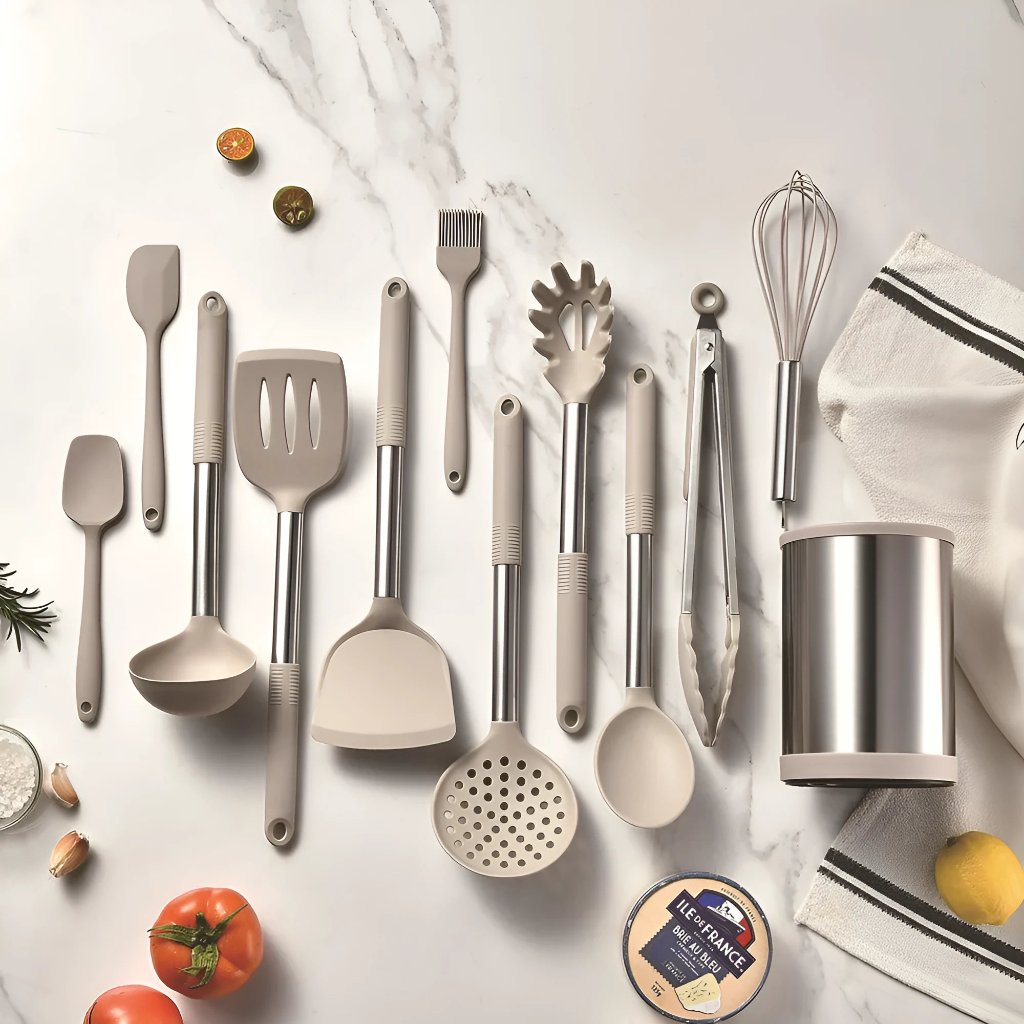 12-piece black silicone kitchen utensil set including spatula, spoon, and claw tools in a rotating storage bucket on a kitchen counter.