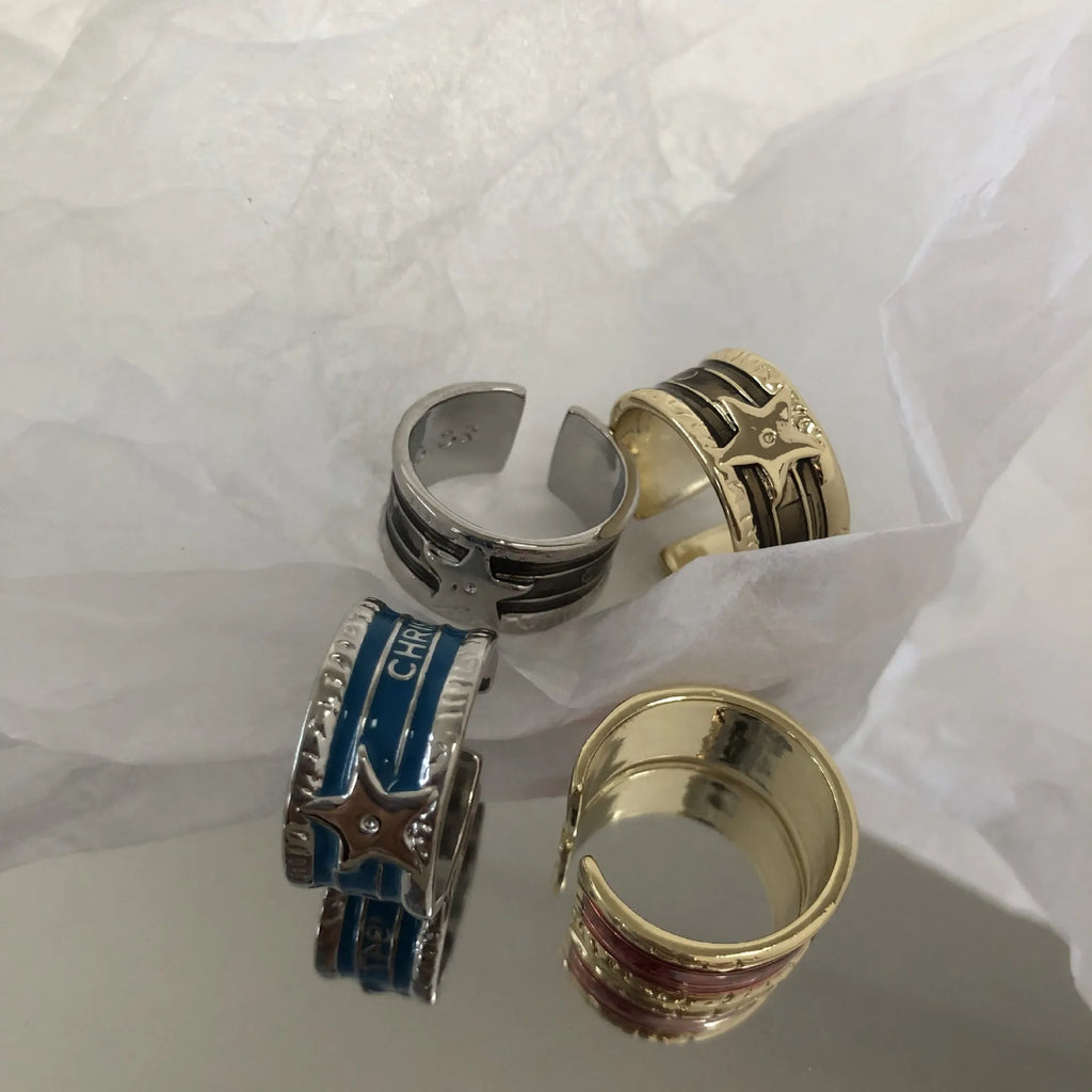 XINGX geometric drop oil ring in a retro distressed finish with adjustable sizing.