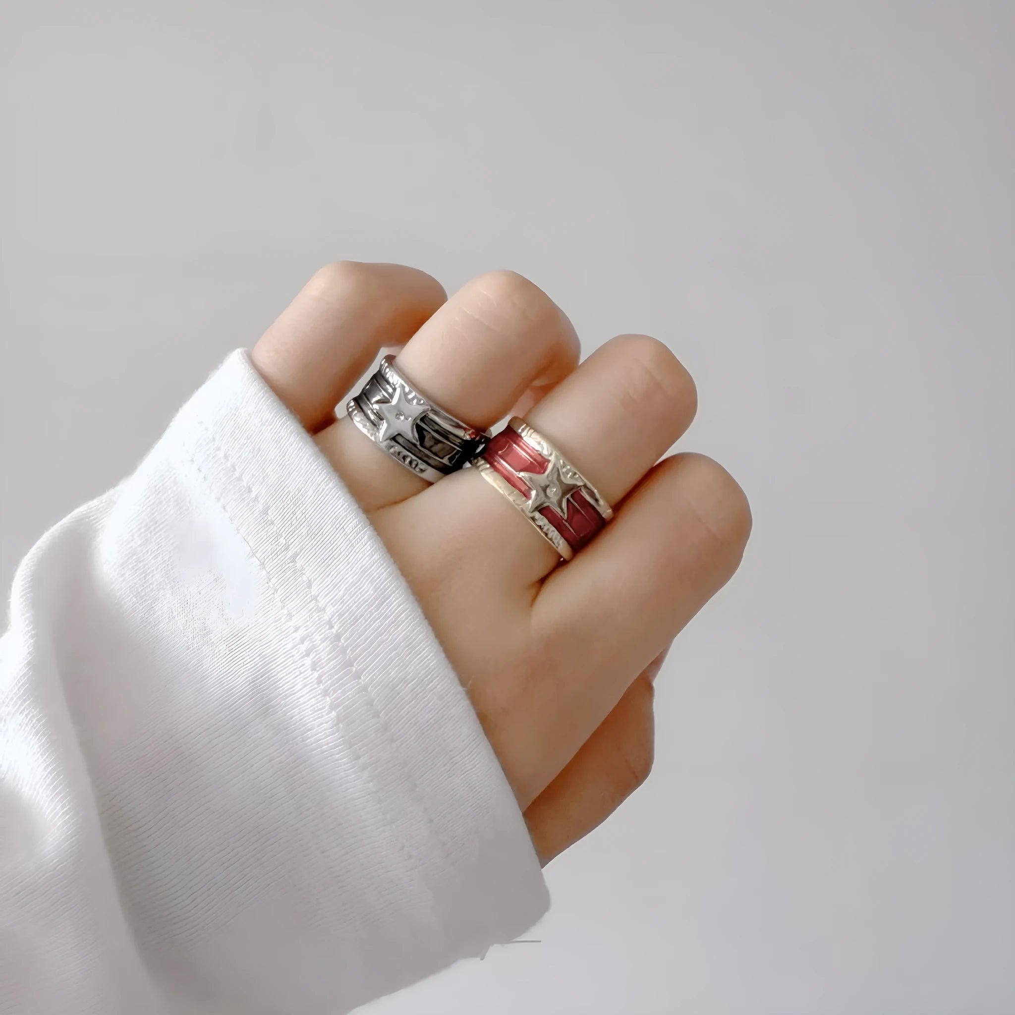 XINGX geometric drop oil ring in a retro distressed finish with adjustable sizing.