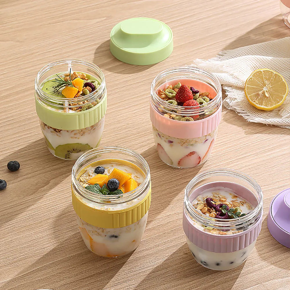 Green microwave-safe plastic salad cup with white lid and spoon, showing leak-proof seal.