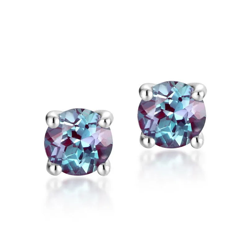 Simple geometric round ear studs with a cultivated Alexander stone in 925 silver.