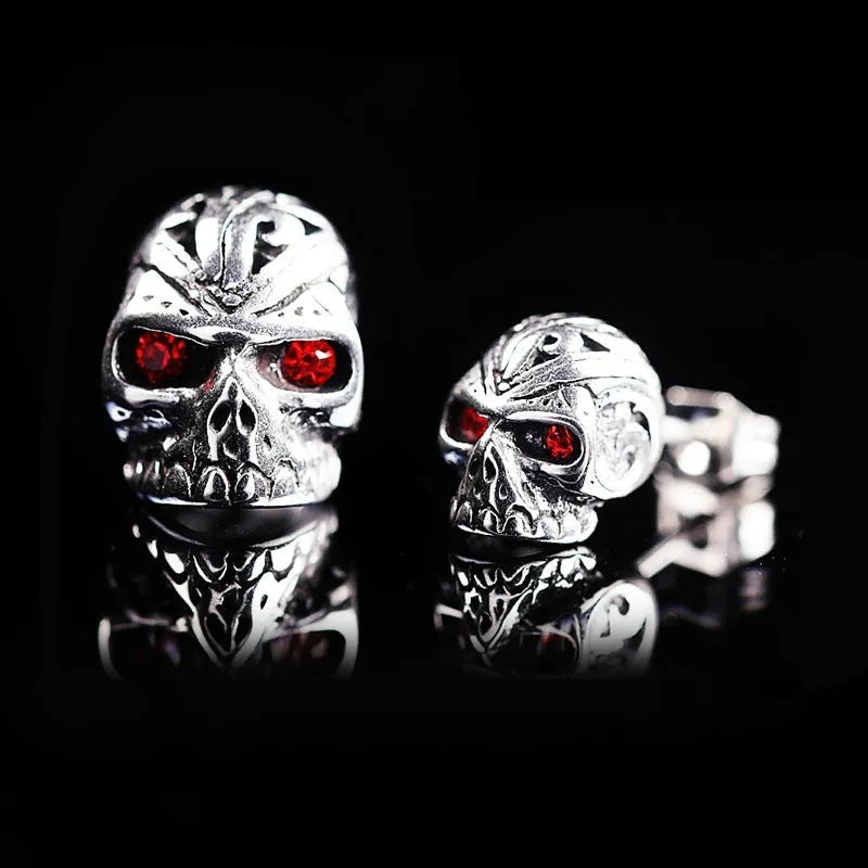 Skull stud earrings with red eye ghost head design and artificial gemstone inlay detailing