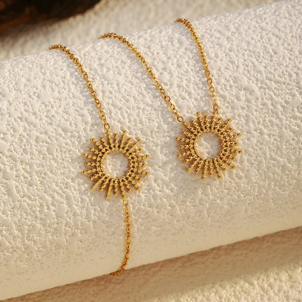 Sunflower Series women's gold necklace and bracelet set with geometric chain design.