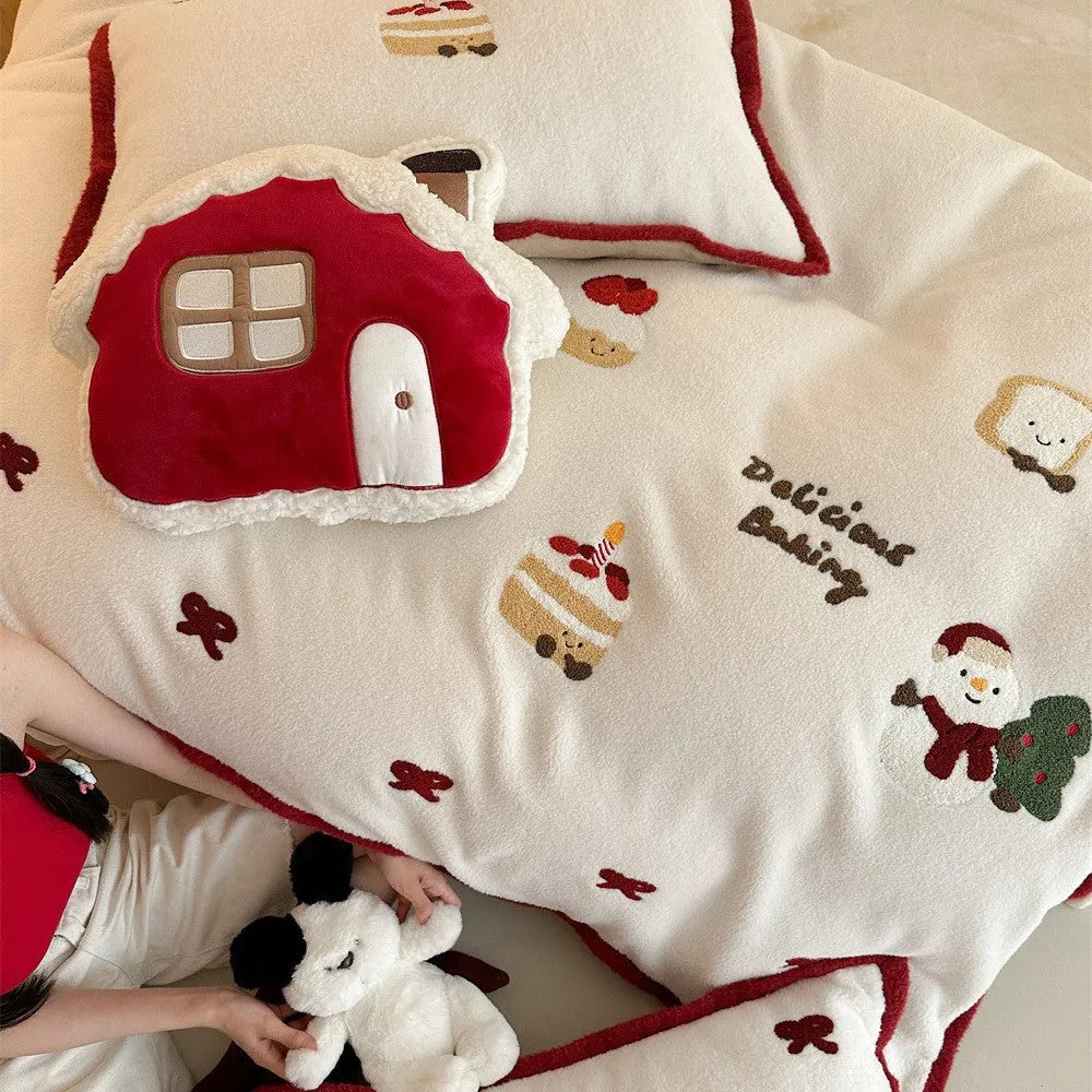 Cartoon winter Christmas themed bedding four-piece set including duvet cover, bed sheet, and two pillowcases made from polyester.