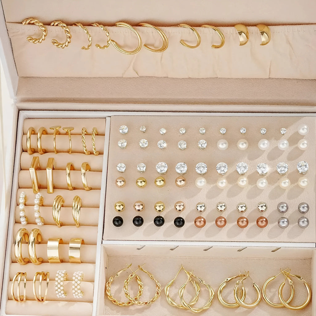 Assortment of 108 gold and yellow geometric alloy earrings with round pearl-like details on a white background.