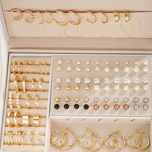 Assortment of 108 gold and yellow geometric alloy earrings with round pearl-like details on a white background.