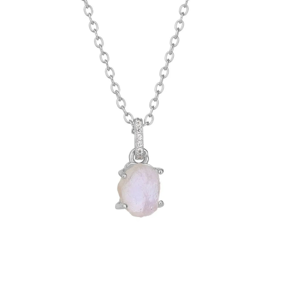 Close-up of a sterling silver necklace with a square moonstone pendant on an adjustable curb chain.