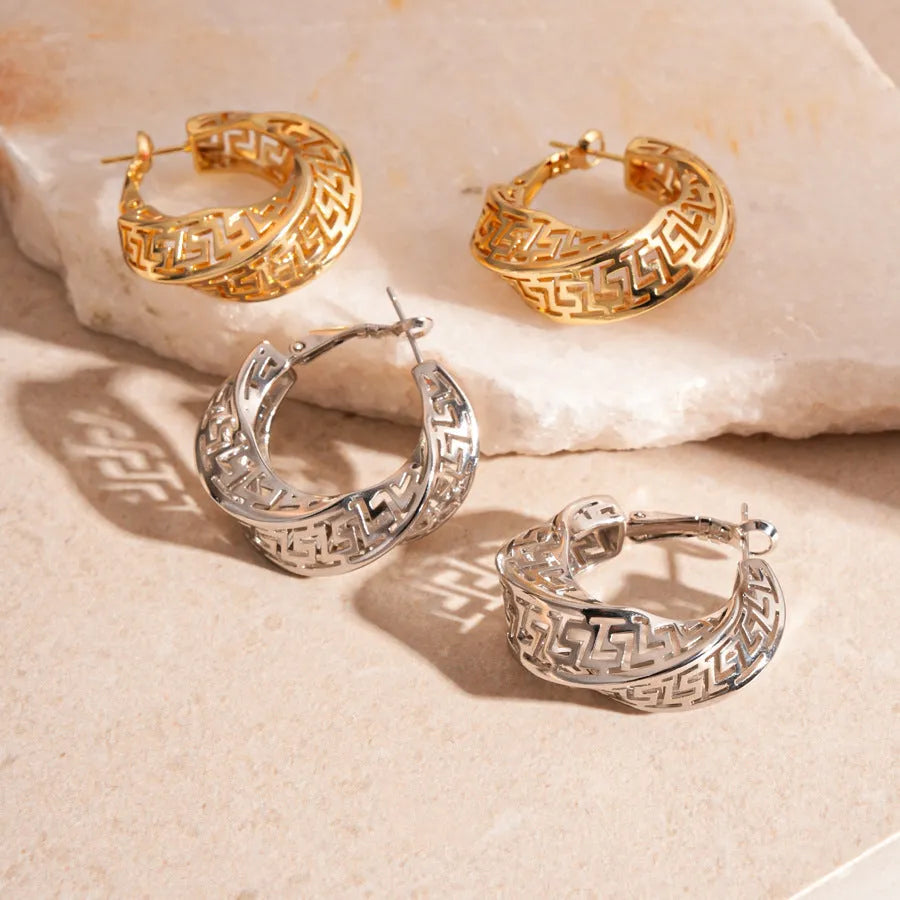 Gold and silver twisted round hollow geometric copper stud earrings for women