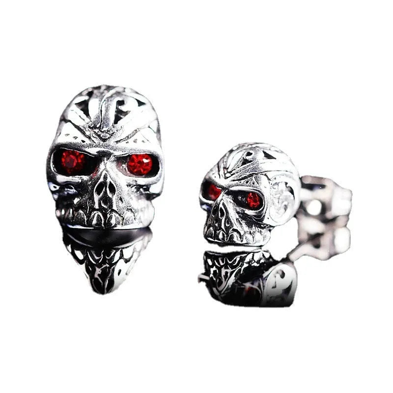 Skull stud earrings with red eye ghost head design and artificial gemstone inlay detailing