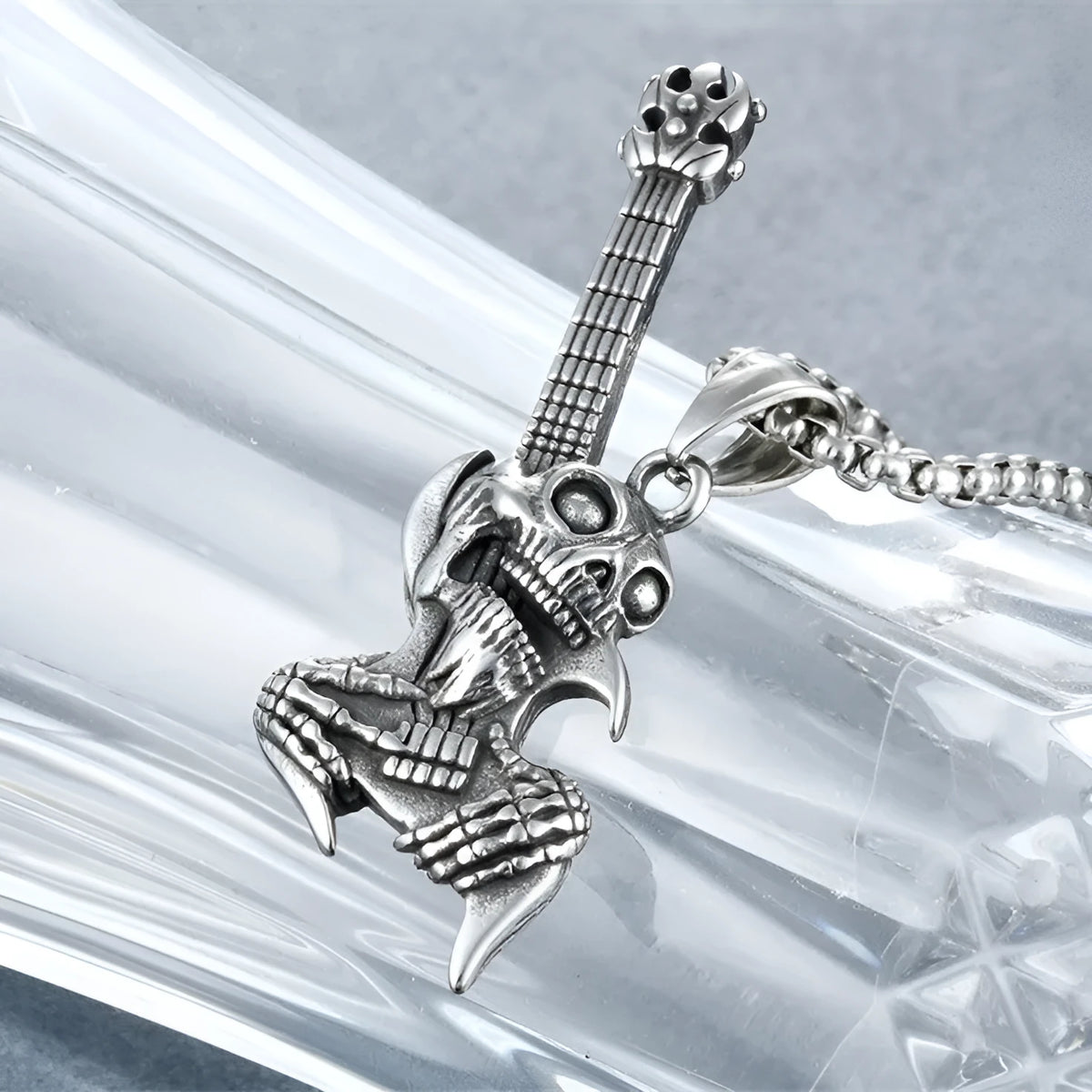 Ethnic skull guitar motorcycle pendant necklace with alloy pendant and titanium steel pearl chain, unisex design.