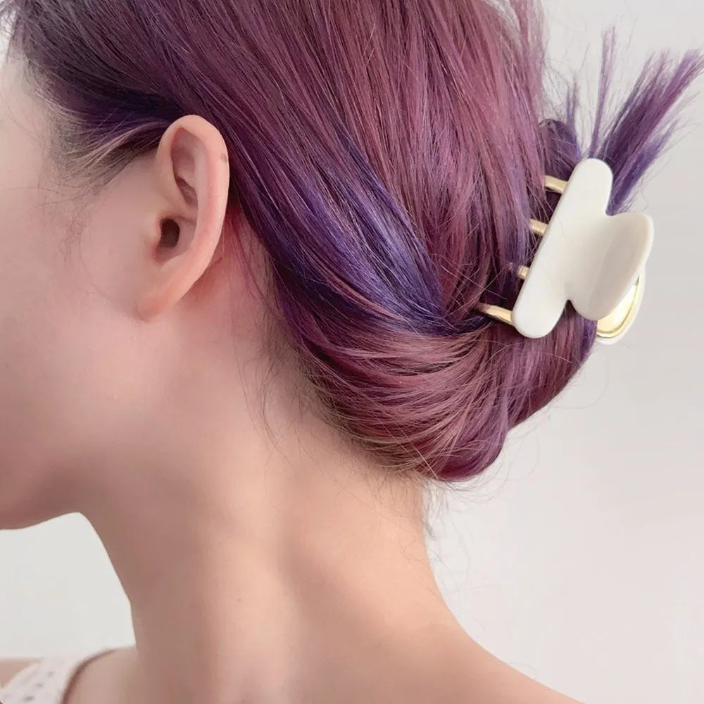 Women's retro acetate hair barrette with metal alloy grip in creamy-white, fairy white, ink colour, and leopard print variations