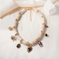 Heart-shaped resin pendant necklace with bamboo detail and adjustable chain