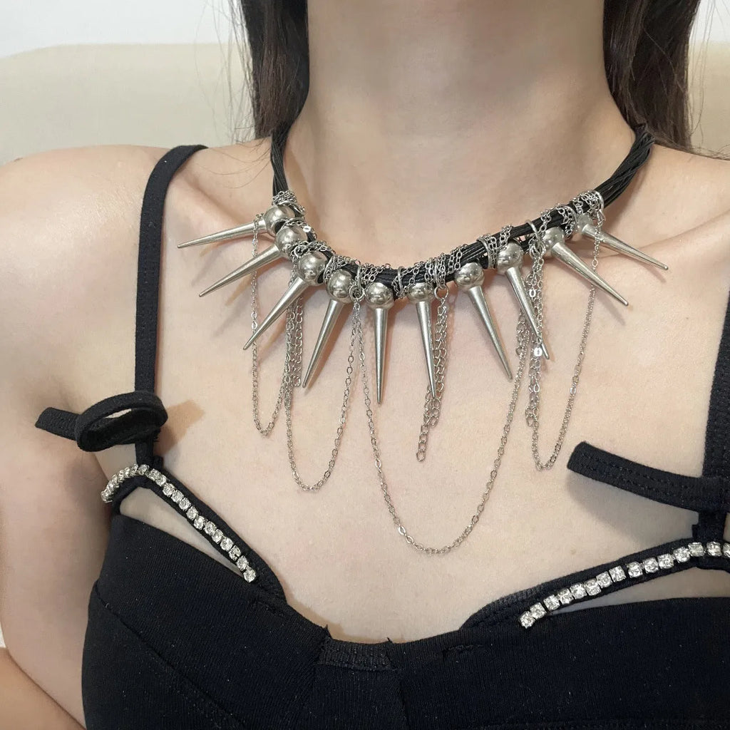 Women's leather necklace with electroplated rivet detail and winding tassel round beads design