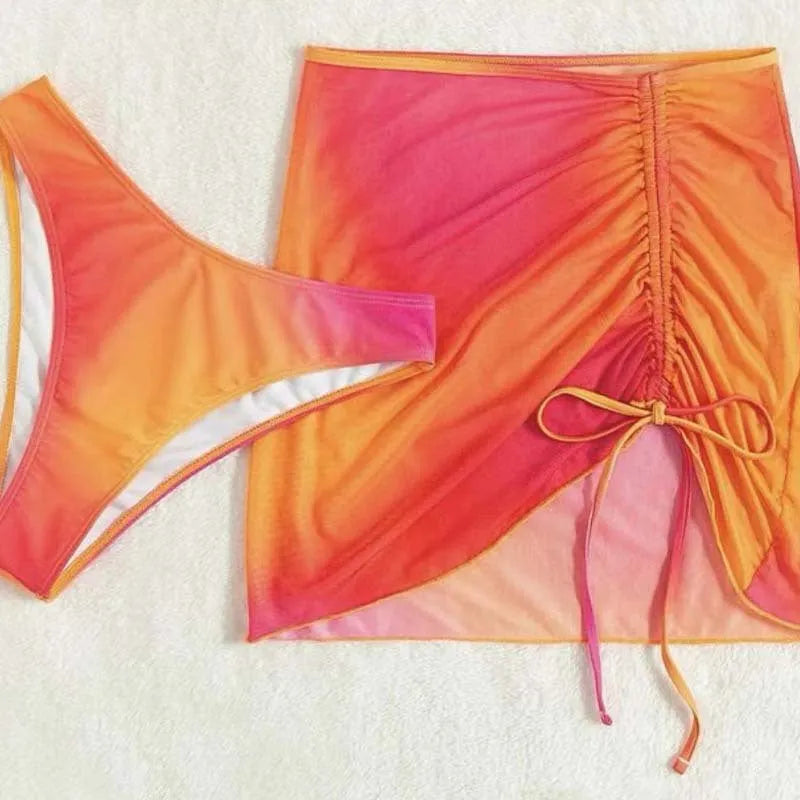 Women's orange three-piece swimsuit with loop buckle hollow suspender and printed gradient pattern