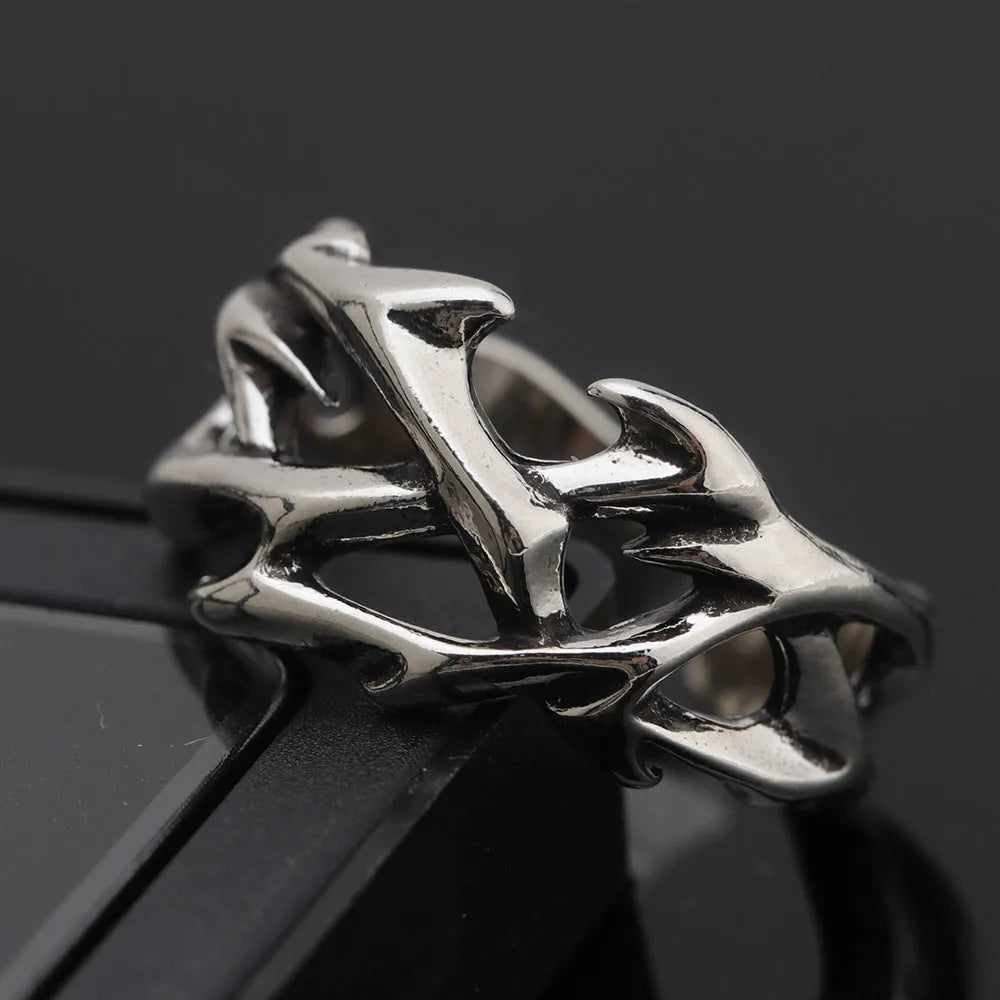 Copper men's ring with geometric thorn flower design and adjustable opening in J2150 thorns colour.