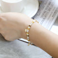 Women's handmade bracelet with imitation pearls and coloured glass beads in European and American jewellery style