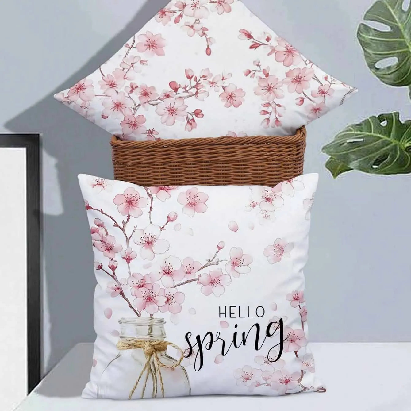 Square short velvet cushion cover with cherry blossom and letter design in four colour options.