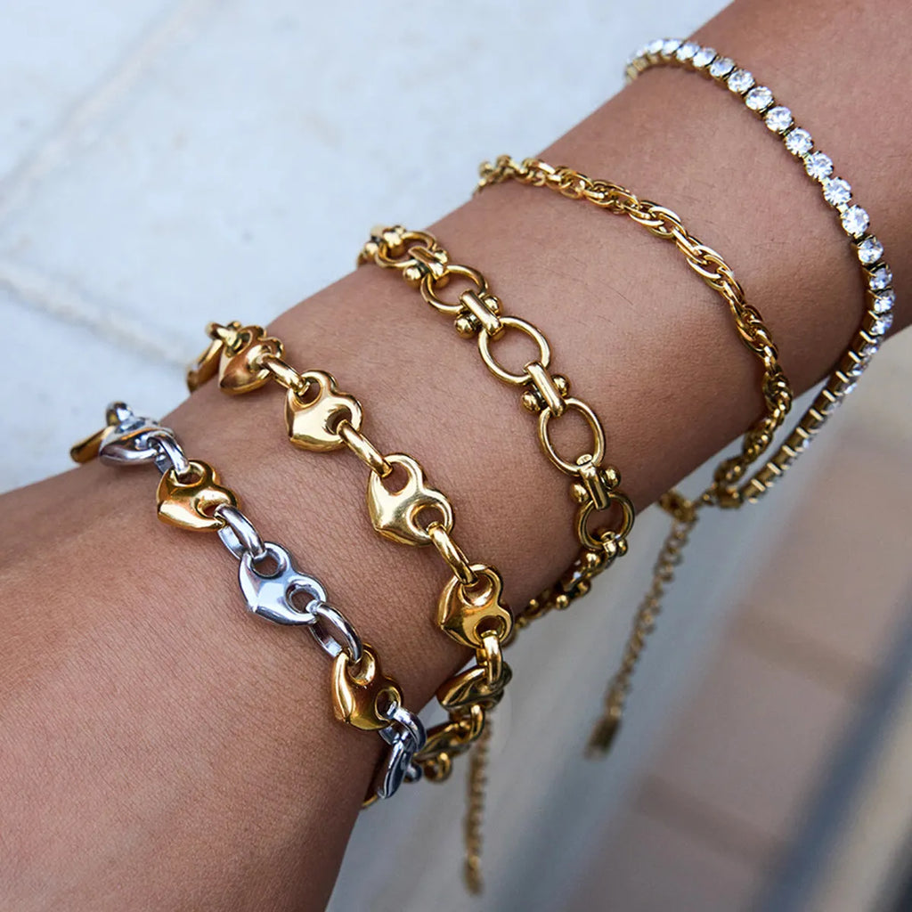 Stainless steel necklace and earrings set for women with bracelet and one pair of earrings in Love Light Luxury style