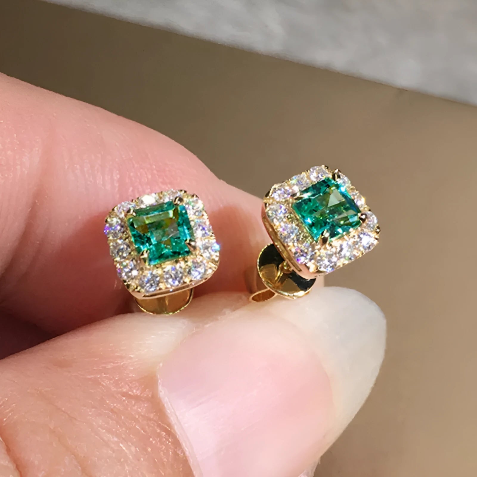 Square green zircon earrings with gold electroplated setting on copper base