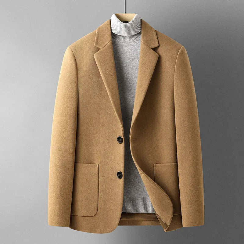 Men's grey slim fit wool suit jacket with a non-ironing finish on a hanger.