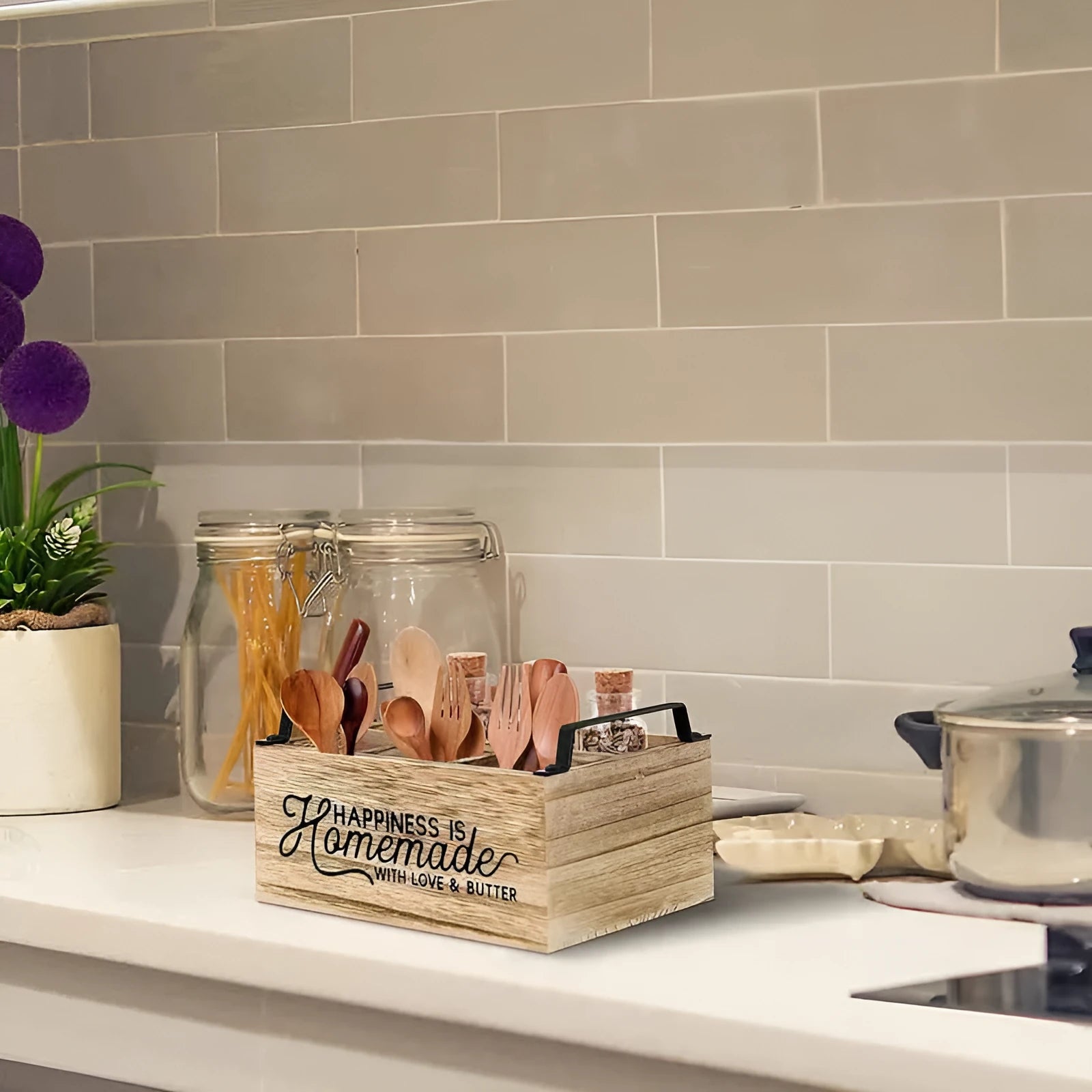 Large wooden kitchen storage box with internal grid divider for organising utensils.
