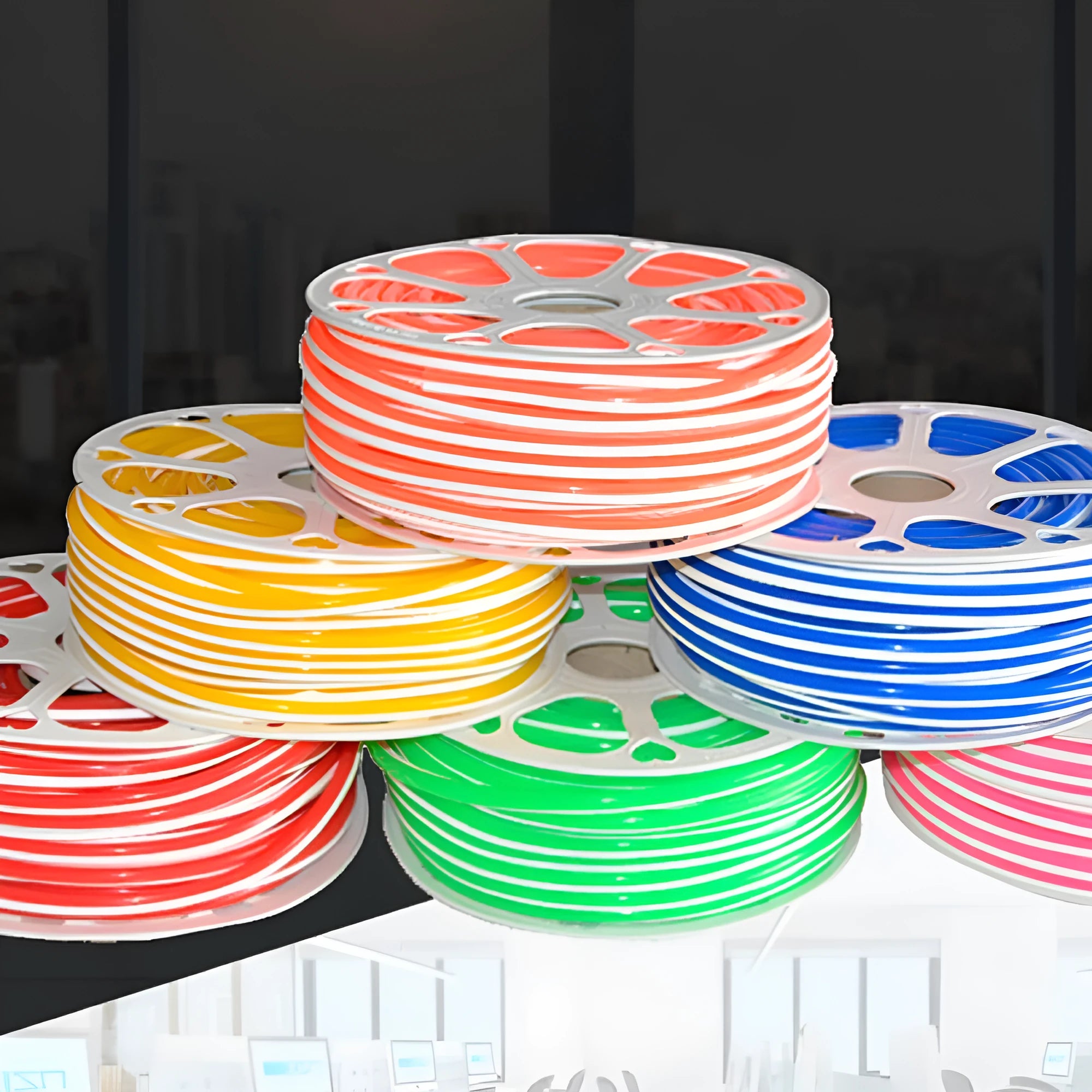 Flexible silicone neon light bar in various colours showing 8mm width and coiled 50 metre length