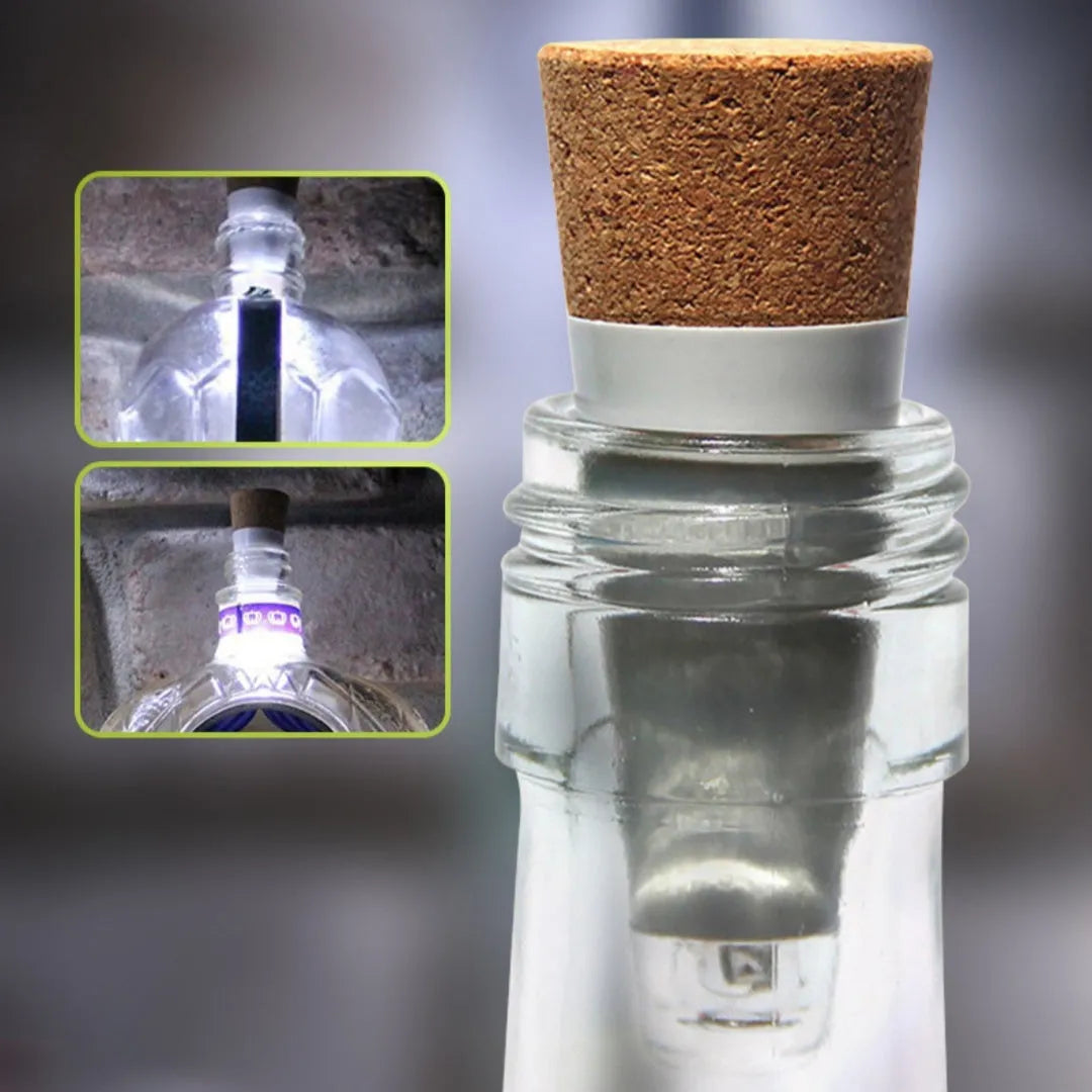 White plastic USB-rechargeable LED cork light for inserting into wine bottle neck.
