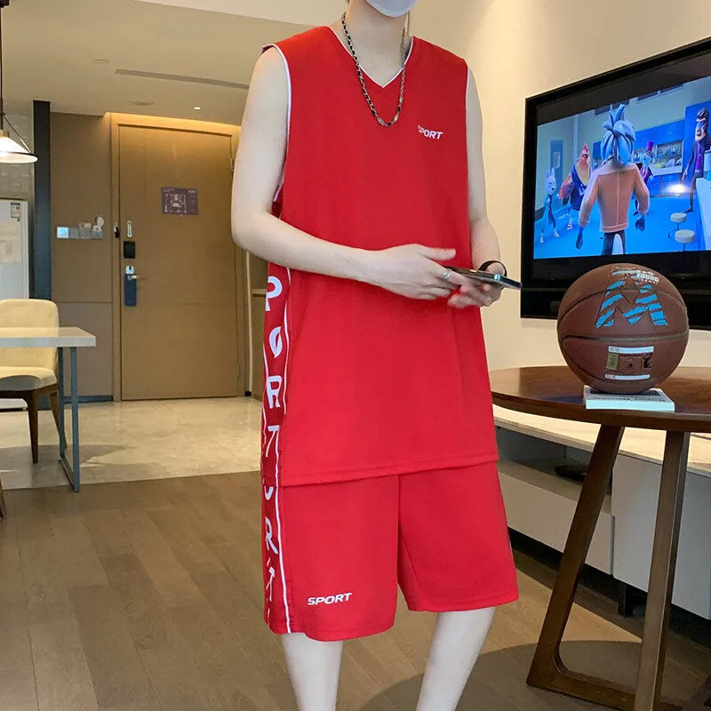Polyester basketball sports suit with short sleeve vest and matching shorts in various colours