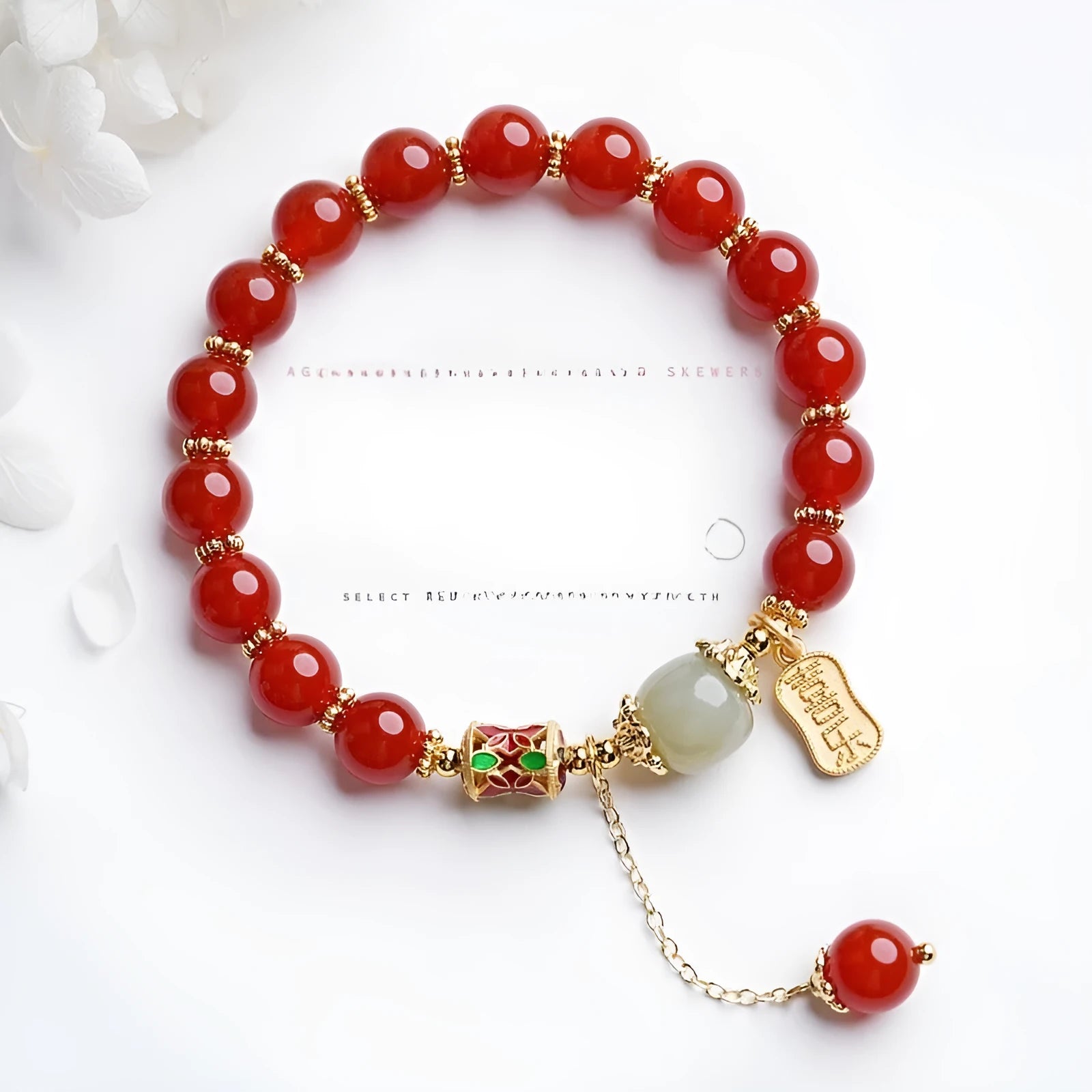 Women's bracelet with red agate and Hetian jade beads on gold-plated links in three design styles.