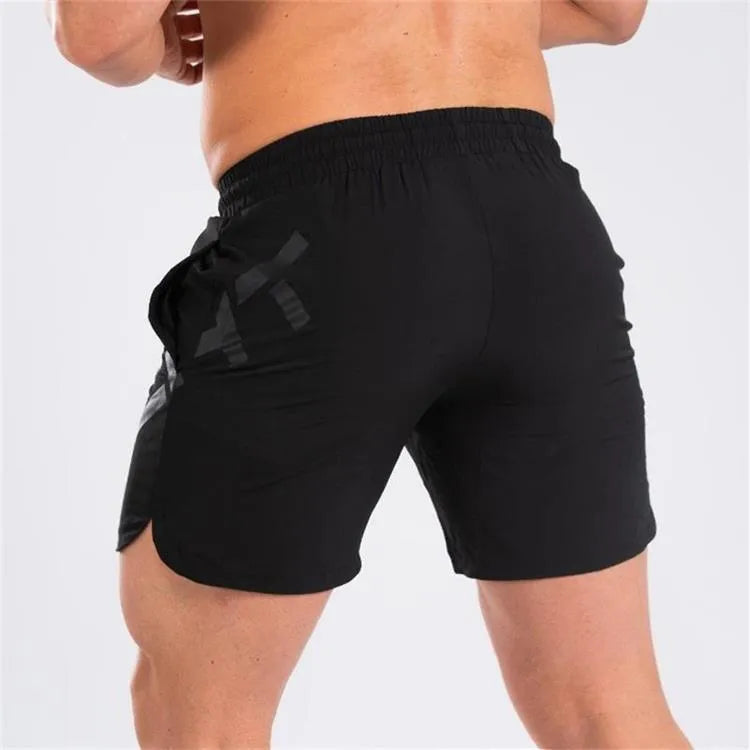 Men's knee-length training shorts with elastic waist in black, dark grey, navy blue or white