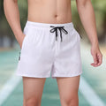 Men's black ice silk fitness shorts with drawstring waist and micro-elastic polyester fabric
