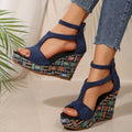 Women's beige ankle-strap sandals with a buckle and thick, textured rubber soles on a plain background.