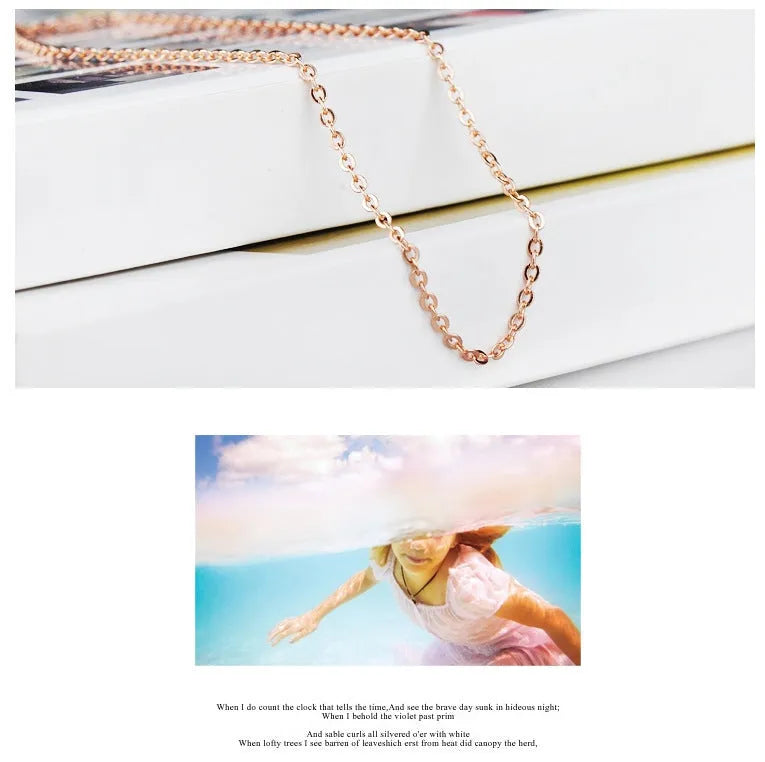 Women's heart-shaped pink crystal pendant necklace with rose gold electroplated cross chain