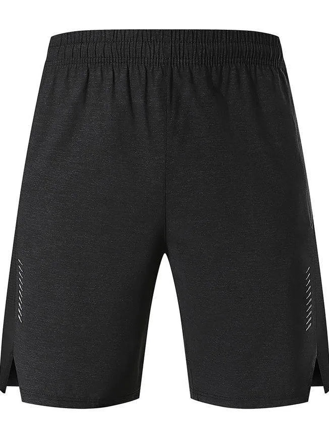 Man wearing forest green five-point single layer spandex casual shorts, showing mid-waist and shorts length fit.