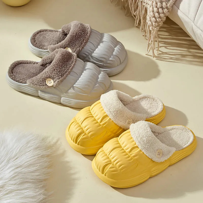 Removable fluffy slippers in beige with faux fur lining and Velcro fastening on a wooden floor