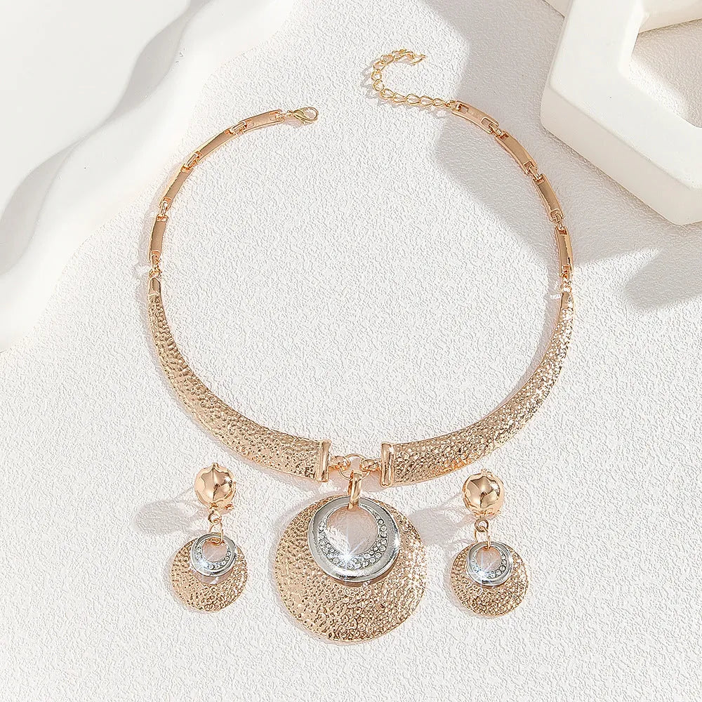 Gold alloy circle necklace and earrings set for women with celestial pattern options